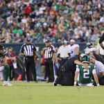August 12, 2022, Philadelphia, PA, United States of America: New York Jets quarterback ZACH WILSON 2 is checked out by medical staff as New York Jets tight end C.J. UZOMAH 87 looks on during a preseason game between the Philadelphia Eagles and the New York Jets Friday, Aug 12, 2022, at Lincoln financial Field in Philadelphia, PA. Philadelphia United States of America - ZUMAs124 20220812_zap_s124_036 Copyright: xSaquanxStimpsonx