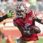 San Francisco 49ers quarterback Trey Lance 5 eludes a Seattle Seahawks hand in the fourth quarter at Levi s Stadium in Santa Clara, California on Sunday, October 3, 2021. The Seahawks defeated the 49ers 28- 21. PUBLICATIONxINxGERxSUIxAUTxHUNxONLY SXP2021100323 TERRYxSCHMITT