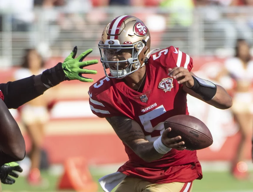 San Francisco 49ers quarterback Trey Lance 5 eludes a Seattle Seahawks hand in the fourth quarter at Levi s Stadium in Santa Clara, California on Sunday, October 3, 2021. The Seahawks defeated the 49ers 28- 21. PUBLICATIONxINxGERxSUIxAUTxHUNxONLY SXP2021100323 TERRYxSCHMITT