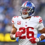 INGLEWOOD, CA - DECEMBER 12: New York Giants Running Back Saquon Barkley 26 looks on during the NFL, American Football Herren, USA game between the New York Giants and the Los Angeles Chargers on December 12, 2021, at SoFi Stadium in Inglewood, CA. Photo by Brian Rothmuller/Icon Sportswire NFL: DEC 12 Giants at Chargers Icon211212098