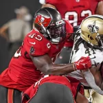 Tampa Bay Buccaneers Devin White 45 wraps up New Orleans Saints running back Alvin Kamara 41 during the first half at Raymond James Stadium in Tampa, Florida on Sunday, December 19, 2021. PUBLICATIONxINxGERxSUIxAUTxHUNxONLY TPA20211219107 STEVExNESIUS