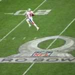 February 6, 2022: New England Patriots quarterback Mac Jones 10 running for a touchdown, but the ball was ruled dead during the NFL, American Football Herren, USA Pro Bowl game at Allegiant Stadium in Las Vegas, Nevada. /CSM Las Vegas United States of America - ZUMAc04_ 20220206_zaf_c04_216 Copyright: xDarrenxLeex