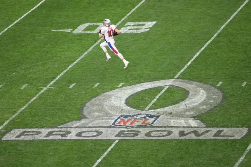 February 6, 2022: New England Patriots quarterback Mac Jones 10 running for a touchdown, but the ball was ruled dead during the NFL, American Football Herren, USA Pro Bowl game at Allegiant Stadium in Las Vegas, Nevada. /CSM Las Vegas United States of America - ZUMAc04_ 20220206_zaf_c04_216 Copyright: xDarrenxLeex