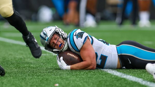 CHARLOTTE, NC - SEPTEMBER 25: Christian McCaffrey 22 of the Carolina Panthers looks for the first down marker after getting tackled in the middle of the field during a football game between the Carolina Panthers and the New Orleans Saints on September 25, 2022, at Bank of America Stadium in Charlotte, NC. Photo by David Jensen/Icon Sportswire NFL, American Football Herren, USA SEP 25 Saints at Panthers Icon220925050