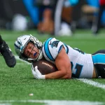 CHARLOTTE, NC - SEPTEMBER 25: Christian McCaffrey 22 of the Carolina Panthers looks for the first down marker after getting tackled in the middle of the field during a football game between the Carolina Panthers and the New Orleans Saints on September 25, 2022, at Bank of America Stadium in Charlotte, NC. Photo by David Jensen/Icon Sportswire NFL, American Football Herren, USA SEP 25 Saints at Panthers Icon220925050