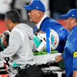 NFL, American Football Herren, USA Miami Dolphins at Cincinnati Bengals Sep 29, 2022 Cincinnati, Ohio, USA Miami Dolphins quarterback Tua Tagovailoa 1 is taken off the field after suffering a head injury following a sack by Cincinnati Bengals defensive tackle Josh Tupou not pictured in the second quarter at Paycor Stadium in Cincinnati. Cincinnati Paycor Stadium Ohio USA, EDITORIAL USE ONLY PUBLICATIONxINxGERxSUIxAUTxONLY Copyright: xKareemxElgazzarx 20220929_jcd_vw2_148