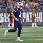 FOXBOROUGH, MA - AUGUST 19: New England Patriots quarterback Bailey Zappe 4 during an NFL, American Football Herren, USA preseason game between the New England Patriots and the Carolina Panthers on August 19, 2022, at Gillette Stadium in Foxborough, Massachusetts. Photo by Fred Kfoury III/Icon Sportswire NFL: AUG 19 Preseason - Panthers at Patriots Icon482220819206