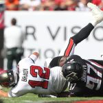 TAMPA, FL - OCTOBER 09: Atlanta Falcons Defensive Tackle Grady Jarrett 97 sacks Tampa Bay Buccaneers Quarterback Tom Brady 12 but receives a penalty on this play during the regular season game between the Atlanta Falcons and the Tampa Bay Buccaneers on October 09, 2022 at Raymond James Stadium in Tampa, Florida. Photo by Cliff Welch/Icon Sportswire NFL, American Football Herren, USA OCT 09 Falcons at Buccaneers Icon357221009026