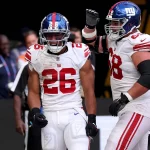 RECORD DATE NOT STATED 9th October 2022 Tottenham Hotspur Stadium. Tottenham, London, England NFL, American Football Herren, USA UK football, New York Giants versus GreenBay Packers: New York Giants Running Back Saquon Barkley 26 celebrates after he scores a touch down PUBLICATIONxNOTxINxUK ActionPlus12434855 ShaunxBrooks