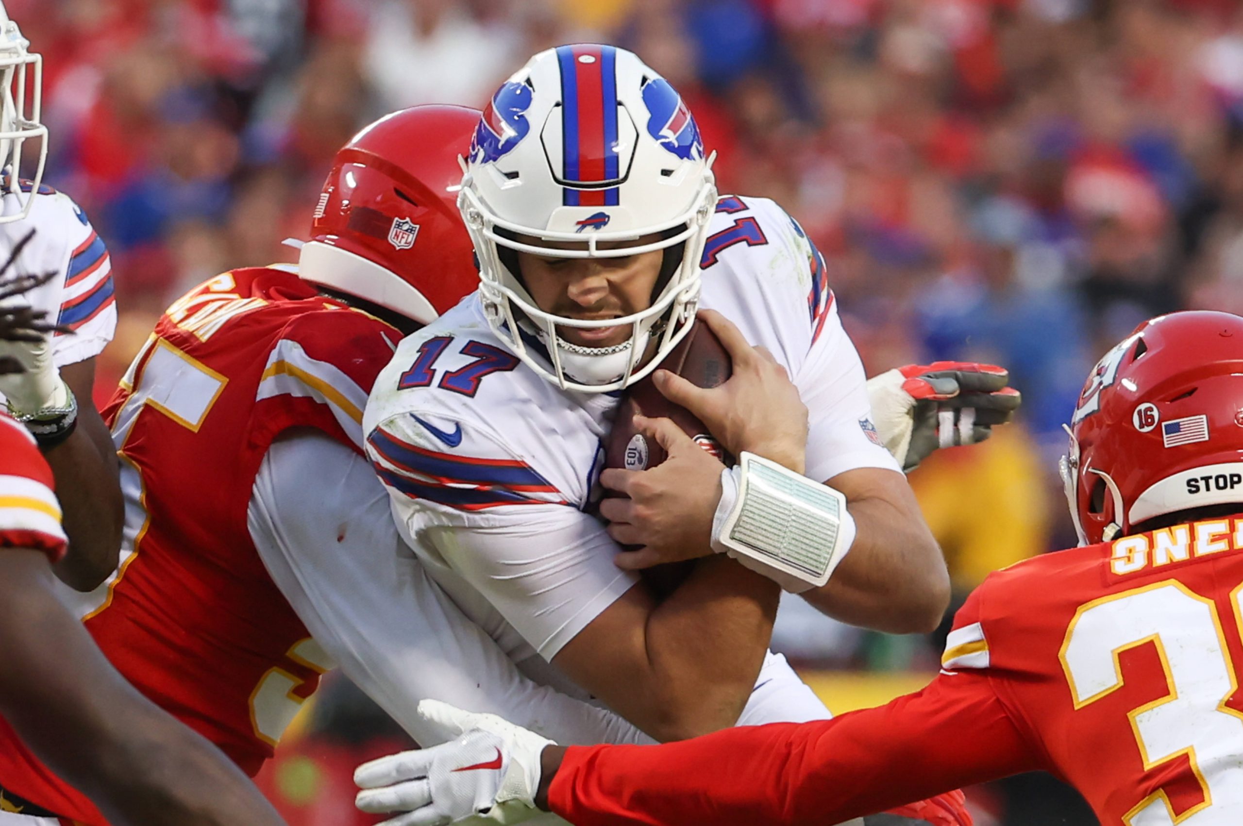 KANSAS CITY, MO - OCTOBER 16: Buffalo Bills quarterback Josh Allen 17 secures the ball as he is tackled in the fourth quarter of an NFL, American Football Herren, USA game between the Buffalo Bills and Kansas City Chiefs on October 16, 2022 at GEHA Field at Arrowhead Stadium in Kansas City, MO. Photo by Scott Winters/Icon Sportswire NFL: OCT 16 Bills at Chiefs Icon2210160840