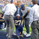 NFL, American Football Herren, USA Seattle Seahawks at Los Angeles Chargers Oct 23, 2022 Inglewood, California, USA Los Angeles Chargers cornerback J.C. Jackson 27 grimaces in pain as the medical team tries to life him off the ground after he was injured defending Seattle Seahawks wide receiver Marquise Goodwin 11 on a touchdown pass in the first half against the Los Angeles Chargers at SoFi Stadium. Inglewood SoFi Stadium California USA, EDITORIAL USE ONLY PUBLICATIONxINxGERxSUIxAUTxONLY Copyright: xJaynexKamin-Onceax 20221023_tbs_aj4_264