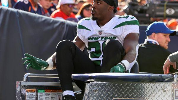 DENVER, CO - OCTOBER 23: New York Jets running back Breece Hall gets carted off the field after getting injured during a NFL, American Football Herren, USA game between the New York Jets and the Denver Broncos on October 23, 2022 at Empower Field at Mile High in Denver, CO. Photo by Steve Nurenberg/Icon Sportswire NFL: OCT 23 Jets at Broncos Icon221023102