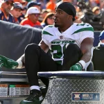 DENVER, CO - OCTOBER 23: New York Jets running back Breece Hall gets carted off the field after getting injured during a NFL, American Football Herren, USA game between the New York Jets and the Denver Broncos on October 23, 2022 at Empower Field at Mile High in Denver, CO. Photo by Steve Nurenberg/Icon Sportswire NFL: OCT 23 Jets at Broncos Icon221023102
