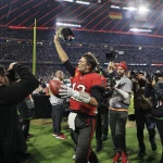 Tampa Bay Buccaneers quarterback Tom Brady (12) acknowledges fans following an NFL football game against the Seattle Seahawks on Sunday, November 13, 2022 in Munich, Germany. (Aaron Doster/NFL)