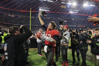 Tampa Bay Buccaneers quarterback Tom Brady (12) acknowledges fans following an NFL football game against the Seattle Seahawks on Sunday, November 13, 2022 in Munich, Germany. (Aaron Doster/NFL)