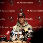 Tampa Bay Buccaneers quarterback Tom Brady attends a news conference after a practice session in Munich, Germany, Friday, Nov. 11, 2022. The Tampa Bay Buccaneers are set to play the Seattle Seahawks in an NFL game at the Allianz Arena in Munich on Sunday. (AP Photo/Matthias Schrader)