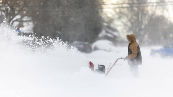 November 19, 2022, Fort Erie, ON, Canada: A man uses a snowblower in Fort Erie, Ont., during an early winter storm that delivered high winds and large amounts of snow across southern Ontario and western New York, Saturday, Nov. 19, 2022. Fort Erie Canada PUBLICATIONxINxGERxSUIxAUTxONLY - ZUMAc35_ 20221119_zaf_c35_121 Copyright: xNickxIwanyshynx