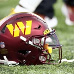 INDIANAPOLIS, IN - OCTOBER 30: A Washington Commanders helmet sits on the turf prior to an NFL, American Football Herren, USA game between the Washington Commanders and the Indianapolis Colts on October 30, 2022 at Lucas Oil Stadium in Indianapolis, IN. Photo by Jeffrey Brown/Icon Sportswire NFL: OCT 30 Commanders at Colts Icon10302258