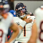 ATLANTA, GA NOVEMBER 20: Chicago quarterback Justin Fields 1 reacts after injuring his shoulder during the NFL, American Football Herren, USA game between the Chicago Bears and the Atlanta Falcons on November 20th, 2022 at Mercedes-Benz Stadium in Atlanta, GA. Photo by Rich von Biberstein/Icon Sportswire NFL: NOV 20 Bears at Falcons Icon221120107