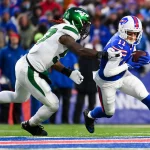 NFL, American Football Herren, USA New York Jets at Buffalo Bills, Jan 9, 2022 Orchard Park, New York, USA Buffalo Bills wide receiver Cole Beasley 11 runs with the ball after a catch as New York Jets middle linebacker C.J. Mosley 57 defends during the first half at Highmark Stadium. Mandatory Credit: Rich Barnes-USA TODAY Sports, 09.01.2022 16:28:52, 17479840, Buffalo Bills, Cole Beasley, New York Jets, NPStrans, NFL, TopPic, C.J. Mosley PUBLICATIONxINxGERxSUIxAUTxONLY Copyright: xRichxBarnesx 17479840