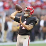 Desmond Ridder - ATLANTA, GA - OCTOBER 16: Atlanta Falcons rookie quarterback Desmond Ridder 4 warms up before the NFL, American Football Herren, USA football game between the Atlanta Falcons and the San Francisco 49ers on October 16, 2022 at Mercedes-Benz Stadium in Atlanta, Georgia. Photo by David J. Griffin/Icon Sportswire NFL: OCT 16 49ers at Falcons Icon9532210161021