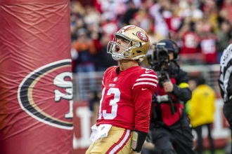 SANTA CLARA, CA - DECEMBER 11: San Francisco 49ers quarterback Brock Purdy 13 celebrates a touchdown in the second quarter of an NFL, American Football Herren, USA game between the San Francisco 49ers and Tampa Bay Buccaneers on December 11, 2022, at Levis Stadium, in Santa Clara, CA. Photo by Tony Ding/Icon Sportswire NFL: DEC 11 Buccaneers at 49ers Icon46520221211001