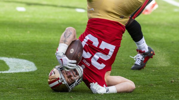 SANTA CLARA, CA - DECEMBER 11: San Francisco 49ers running back Christian McCaffrey 23 gets turned upside down rushing in the first quarter of an NFL, American Football Herren, USA game between the San Francisco 49ers and Tampa Bay Buccaneers on December 11, 2022, at Levis Stadium, in Santa Clara, CA. Photo by Tony Ding/Icon Sportswire NFL: DEC 11 Buccaneers at 49ers Icon46520221211025