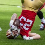 SANTA CLARA, CA - DECEMBER 11: San Francisco 49ers running back Christian McCaffrey 23 gets turned upside down rushing in the first quarter of an NFL, American Football Herren, USA game between the San Francisco 49ers and Tampa Bay Buccaneers on December 11, 2022, at Levis Stadium, in Santa Clara, CA. Photo by Tony Ding/Icon Sportswire NFL: DEC 11 Buccaneers at 49ers Icon46520221211025