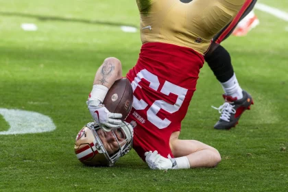 SANTA CLARA, CA - DECEMBER 11: San Francisco 49ers running back Christian McCaffrey 23 gets turned upside down rushing in the first quarter of an NFL, American Football Herren, USA game between the San Francisco 49ers and Tampa Bay Buccaneers on December 11, 2022, at Levis Stadium, in Santa Clara, CA. Photo by Tony Ding/Icon Sportswire NFL: DEC 11 Buccaneers at 49ers Icon46520221211025