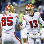NFL, American Football Herren, USA San Francisco 49ers at Seattle Seahawks Dec 15, 2022 Seattle, Washington, USA San Francisco 49ers quarterback Brock Purdy 13 celebrates with tight end George Kittle 85 during the late fourth quarter against the Seattle Seahawks at Lumen Field. Seattle Lumen Field Washington USA, EDITORIAL USE ONLY PUBLICATIONxINxGERxSUIxAUTxONLY Copyright: xJoexNicholsonx 20221215_jmn_sn8_029
