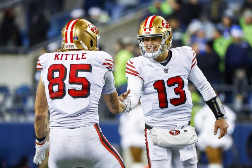 NFL, American Football Herren, USA San Francisco 49ers at Seattle Seahawks Dec 15, 2022 Seattle, Washington, USA San Francisco 49ers quarterback Brock Purdy 13 celebrates with tight end George Kittle 85 during the late fourth quarter against the Seattle Seahawks at Lumen Field. Seattle Lumen Field Washington USA, EDITORIAL USE ONLY PUBLICATIONxINxGERxSUIxAUTxONLY Copyright: xJoexNicholsonx 20221215_jmn_sn8_029