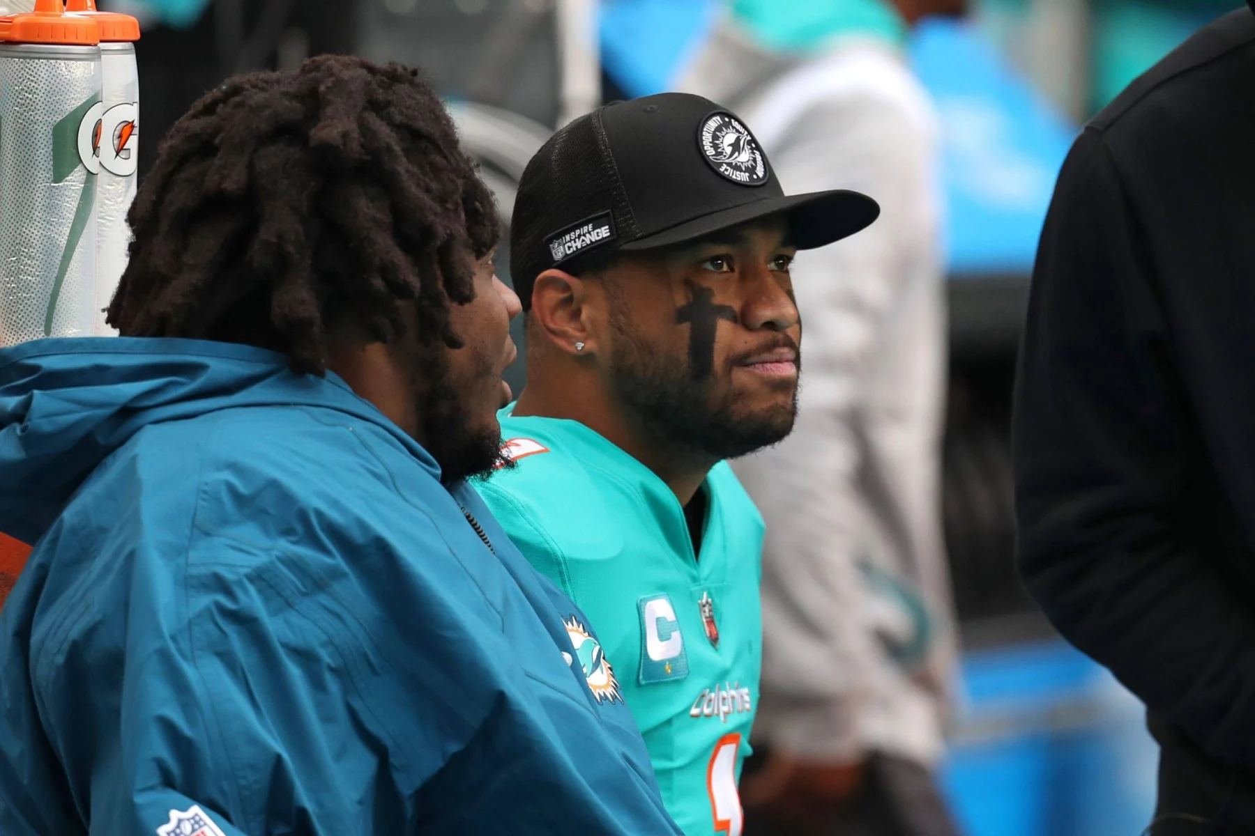 December 26, 2022: Dolphins quarterback Tua Tagovailoa sits on the bench vs. the Packers on Dec. 25. He was put in the concussion protocol on Monday, and Teddy Bridgewater left will likely start for Miami in New England. - ZUMAm67_ 20221226_zaf_m67_028 Copyright: xJohnxMccallx