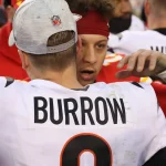 KANSAS CITY, MO - JANUARY 30: Kansas City Chiefs quarterback Patrick Mahomes 15 and Cincinnati Bengals quarterback Joe Burrow 9 hug at midfield after the AFC Championship game between the Cincinnati Bengals and Kansas City Chiefs on Jan 30, 2022 at GEHA Field at Arrowhead Stadium in Kansas City, MO. Photo by Scott Winters/Icon Sportswire NFL, American Football Herren, USA JAN 30 AFC Conference Championship - Bengals at Chiefs Icon2201300621