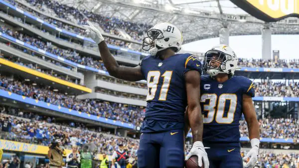 October 23, 2022, Los Angeles, California, USA: Los Angeles Chargers wide receiver Mike Williams 81 celebrates with running back Austin Ekeler 30 after scoring a touchdown against the Seattle Seahawks during the first half at an NFL, American Football Herren, USA football game, Saturday, Oct. 23, 2022, in Inglewood, Calif. Los Angeles USA - ZUMAc68_ 20221023_zaf_c68_051 Copyright: xRingoxChiux
