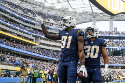 October 23, 2022, Los Angeles, California, USA: Los Angeles Chargers wide receiver Mike Williams 81 celebrates with running back Austin Ekeler 30 after scoring a touchdown against the Seattle Seahawks during the first half at an NFL, American Football Herren, USA football game, Saturday, Oct. 23, 2022, in Inglewood, Calif. Los Angeles USA - ZUMAc68_ 20221023_zaf_c68_051 Copyright: xRingoxChiux
