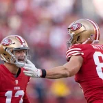 NFL, American Football Herren, USA Washington Commanders at San Francisco 49ers Dec 24, 2022 Santa Clara, California, USA San Francisco 49ers quarterback Brock Purdy 13 and tight end George Kittle 85 celebrate during the third quarter against the Washington Commanders at Levi s Stadium. Santa Clara Levi s Stadium California USA, EDITORIAL USE ONLY PUBLICATIONxINxGERxSUIxAUTxONLY Copyright: xStanxSzetox 20221224_lbm_si6_048