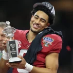 NCAA, College League, USA Football 2022: Allstate Sugar Bowl Alabama vs Kansas St. DEC 31 December 31, 2022: Alabama quarterback Bryce Young 9 is presented the Most Outstanding Player trophy after the 89th annual Allstate Sugar Bowl between the Alabama Crimson Tide and the Kansas St. Wildcats at the Caesars Superdome in New Orleans, LA. Jonathan Mailhes/CSM/Sipa USACredit Image: Jonathan Mailhes/Cal Media/Sipa USA New Orleans Caesars Superdome LA USA PUBLICATIONxINxDZAxARGxAUTxBHRxBRAxCANxCHLxCHNxCOLxECUxEGYxGRCxINDxIRNxIRQxISRxJORxKWTxLBNxLBYxMLTxMEXxMARxOMNxPERxQATxSAUxSUIxSYRxTUNxTURxUAExUKxVENxYEMxONLY PUBLICATIONxINxALGxARGxAUTxBRNxBRAxCANxCHIxCHNxCOLxECUxEGYxGRExINDxIRIxIRQxISRxJORxKUWxLIBxLBAxMLTxMEXxMARxOMAxPERxQATxKSAxSUIxSYRxTUNxTURxUAExUKxVENxYEMxONLY Copyright: xCalxSportxMediax Editorial use only