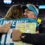 Sport Bilder des Tages January 7, 2023: Jacksonville Jaguars quarterback TREVOR LAWRENCE 16 embraces Jacksonville Jaguars head coach Doug Pederson after winning the game during the Jacksonville Jaguars vs Tennessee Titans NFL, American Football Herren, USA game at TIAA Bank Field Stadium in Jacksonville, Fl on January 7, 2023. - ZUMAk149 20230107_zsp_k149_042 Copyright: xCoryxKnowltonx