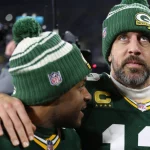 GREEN BAY, WI - JANUARY 08: Green Bay Packers quarterback Aaron Rodgers 12 and Green Bay Packers wide receiver Randall Cobb 18 walk off the field after a game between the Green Bay Packers and the Detroit Lions at Lambeau Field on January 8, 2023 in Green Bay, WI. Photo by Larry Radloff/Icon Sportswire NFL, American Football Herren, USA JAN 08 Lions at Packers Icon2301082392