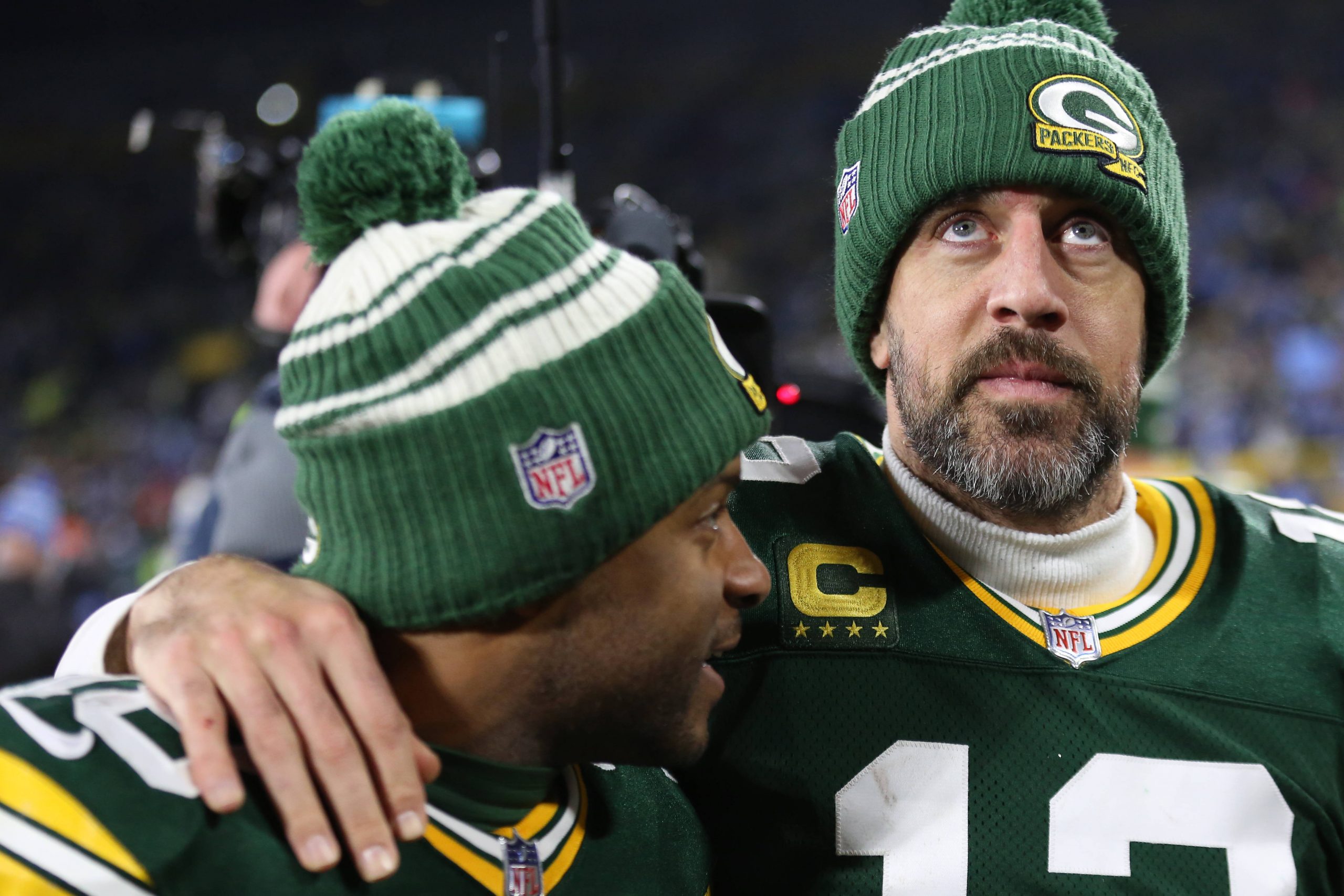 GREEN BAY, WI - JANUARY 08: Green Bay Packers quarterback Aaron Rodgers 12 and Green Bay Packers wide receiver Randall Cobb 18 walk off the field after a game between the Green Bay Packers and the Detroit Lions at Lambeau Field on January 8, 2023 in Green Bay, WI. Photo by Larry Radloff/Icon Sportswire NFL, American Football Herren, USA JAN 08 Lions at Packers Icon2301082392