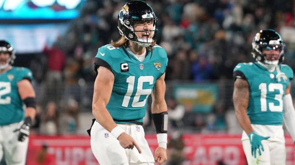 January 14, 2023, Jacksonville, Florida, USA: Jacksonville Jaguars quarterback Trevor Lawrence 16 celebrates his touchdown throw during the wild card playoff game between the Los Angeles Chargers and the Jacksonville Jaguars, Saturday, Jan. 14, 2023 at TIAA Bank Field in Jacksonville, Fla. Jacksonville USA - ZUMAj102 20230114_zap_j102_013 Copyright: xPeterxJoneleitx