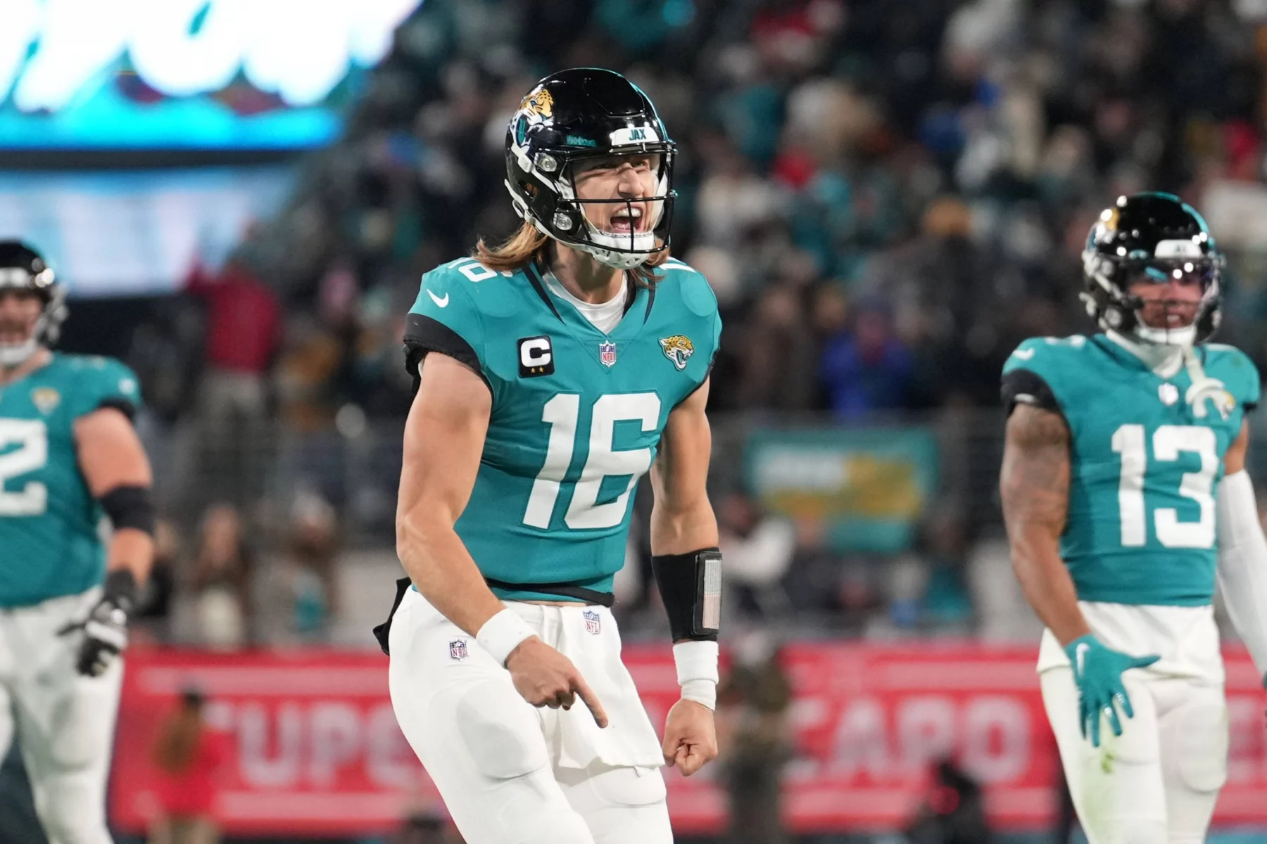 January 14, 2023, Jacksonville, Florida, USA: Jacksonville Jaguars quarterback Trevor Lawrence 16 celebrates his touchdown throw during the wild card playoff game between the Los Angeles Chargers and the Jacksonville Jaguars, Saturday, Jan. 14, 2023 at TIAA Bank Field in Jacksonville, Fla. Jacksonville USA - ZUMAj102 20230114_zap_j102_013 Copyright: xPeterxJoneleitx