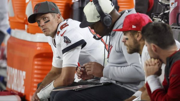 January 16, 2023, Tampa, Florida, USA: Tampa Bay Buccaneers quarterback Tom Brady 12, far left, is seen on the bench during the third quarter against the Dallas Cowboys in an NFC wild-card game Monday, Jan 16, 2023, in Tampa. Tampa USA - ZUMAs70_ 0199589763st Copyright: xDouglasxR.xCliffordx