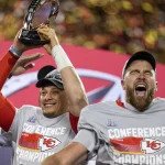 NFL, American Football Herren, USA AFC Championship-Cincinnati Bengals at Kansas City Chiefs Jan 29, 2023 Kansas City, Missouri, USA Kansas City Chiefs quarterback Patrick Mahomes 15 raises the Lamar Hunt Trophy with tight end Travis Kelce 87 after the AFC championship NFL game between the Cincinnati Bengals and the Kansas City Chiefs, Sunday, Jan. 29, 2023, at Arrowhead Stadium in Kansas City, Mo. The Kansas City Chiefs advanced to the Super Bowl with a 23-20 win over the Bengals. Kansas City GEHA Field at Arrowhead Stadium Missouri USA, EDITORIAL USE ONLY PUBLICATIONxINxGERxSUIxAUTxONLY Copyright: xSamxGreenex 20230129_lbm_usa_394