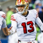 Brock Purdy - George Kittle - NFL, American Football Herren, USA San Francisco 49ers at Seattle Seahawks Dec 15, 2022 Seattle, Washington, USA San Francisco 49ers quarterback Brock Purdy 13 celebrates with tight end George Kittle 85 during the late fourth quarter against the Seattle Seahawks at Lumen Field. Seattle Lumen Field Washington USA, EDITORIAL USE ONLY PUBLICATIONxINxGERxSUIxAUTxONLY Copyright: xJoexNicholsonx 2022-12-15_jmn_sn8_029