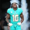 MIAMI GARDENS, FL - JANUARY 08: Miami Dolphins wide receiver Tyreek Hill 10 tries to excite the crowd during pregame introductions before the game between the New York Jets and the Miami Dolphins on Sunday, January 8, 2023 at Hard Rock Stadium, Miami Gardens, Fla. Photo by Peter Joneleit/Icon Sportswire NFL, American Football Herren, USA JAN 08 Jets at Dolphins Icon230108028