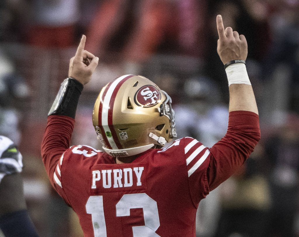 San Francisco 49ers quarterback Brock Purdy 13 celebrates after a 74 yard touchdown pass to wide receiver Deebo Samuel in the fourth quarter against the Seattle Seahawks in the NFC Wildcard game at Levi s Stadium in Santa Clara, California on Saturday, January 14, 2023. The 49ers defeated the Seahawks 41 - NFL Woche 16