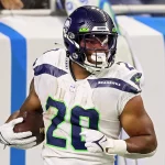 Seattle Seahawks vs Detroit Lions Seattle Seahawks running back Rashaad Penny 20 runs the ball in for a touchdown during an NFL, American Football Herren, USA football game between the Detroit Lions and the Seattle Seahawks in Detroit, Michigan USA, on Sunday, October 2, 2022. Detroit Michigan United States PUBLICATIONxNOTxINxFRA Copyright: xAmyxLemusx originalFilename:lemus-seattles221002_np0Ed.jpg