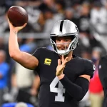 Quarterback Derek Carr, NFL, American Football Herren, USA Los Angeles Chargers at Las Vegas Raiders, Jan 9, 2022 Paradise, Nevada, USA Las Vegas Raiders quarterback Derek Carr 4 warms up before the start of a game against the Los Angeles Chargers at Allegiant Stadium. Mandatory Credit: Stephen R. Sylvanie-USA TODAY Sports, 09.01.2022 16:43:21, 17481719, NPStrans, Las Vegas Raiders, Derek Carr, NFL, Allegiant Stadium, Los Angeles Chargers PUBLICATIONxINxGERxSUIxAUTxONLY Copyright: xStephenxR.xSylvaniex 17481719