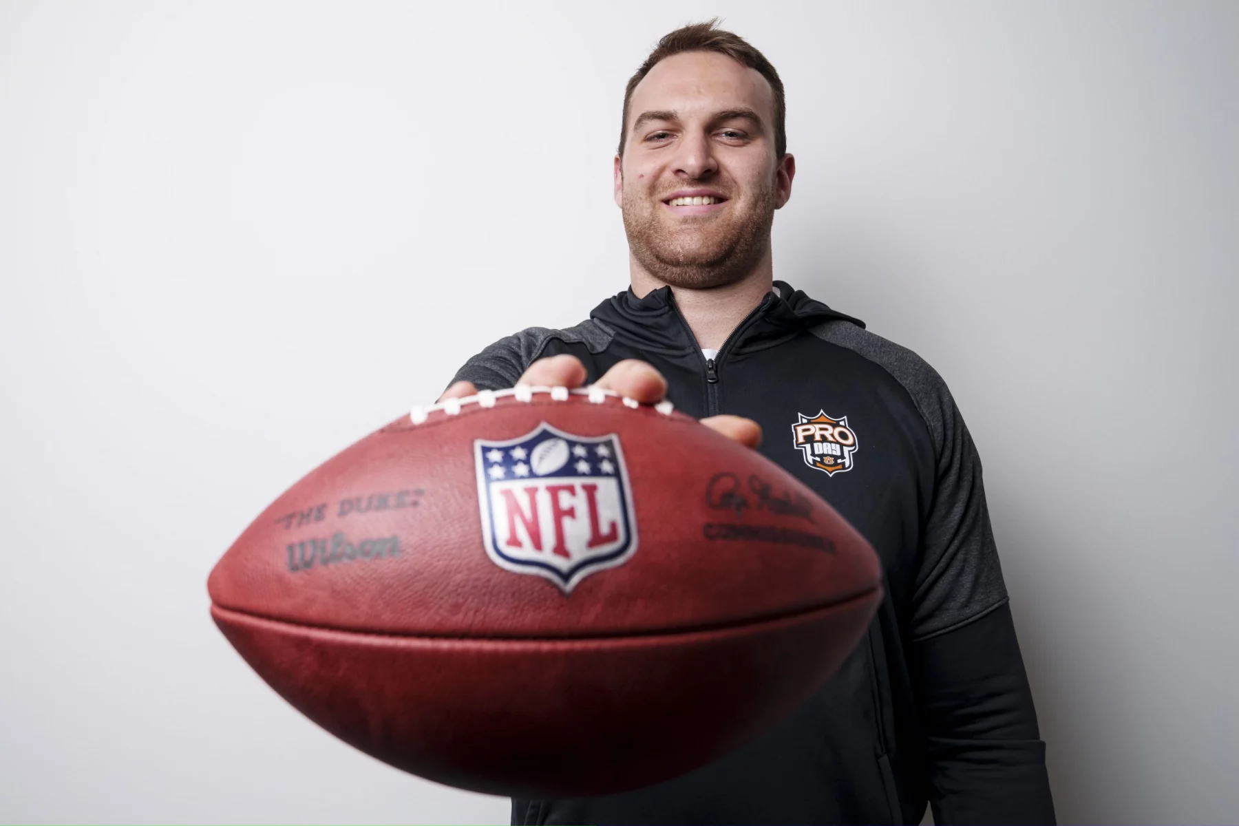 AUBURN, AL - March 20, 2023 - Kilian Zierer poses during a photoshoot in the locker room at the Woltosz Football Performance Center in Auburn, AL.